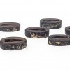 Neun Fuchi, Japan, 19. Jh. Metall, tw. verziert.