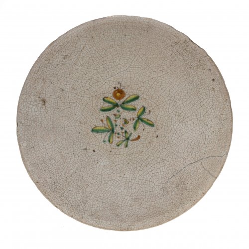 Teller. Majolika. Craquelédekor mit florales Motiv. Italien, 18. Jh. ø26,5 cm.