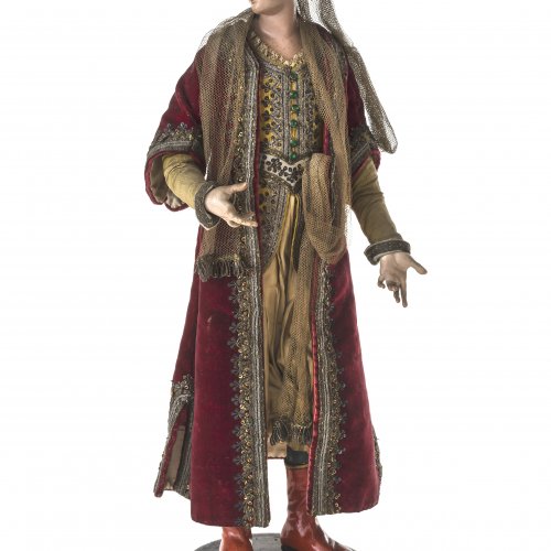 Krippenfigur. Orientalische Prinzessin. Neapel, 18. Jh. Glasaugen, originale Kleidung. H. 39 cm.