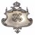 Plakette. Aufgelegtes Monogramm. Silber. bez.: MILLER Wappenform. Inschrift: 