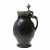 Deckelkrug, Bunzlau, Irdenware, außen dunkelbraun glasiert, schräg gerippt, Zinnmontierung. Best., kleiner Riss. 28 cm.