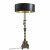 Stehlampe. Messing. Im Stil eines barocken Altarleuchters. Elektr., 2-flammig. H. 153 cm, Lampenschirm schwarz, innen goldfarben, ø 68 cm.