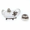 Schälchen und Pillendose. Farbloses Glas, Metallmontierung mit Granatsteinbesatz (unvollständig). Leicht best. H. 7 cm bzw. ø 5 cm.