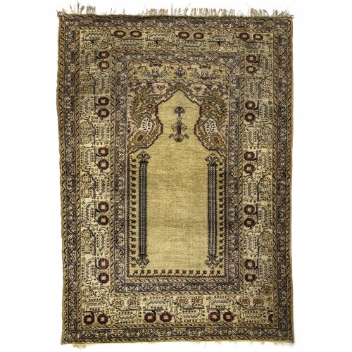 Teppich. Kayseri, Anfang 20. Jh. Seide. Leichte Gebrauchsspuren. 156 x 117 cm.