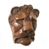 Löwenmaskaron. Roter Marmor. H. 11 cm.
