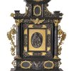 Hausaltar mit hl. Josef. Süddeutsch, wohl Augsburg. Holz, geschwärzt, Messing- und Silberbeschläge, einige Beschläge fehlen. 51 x 34 cm.