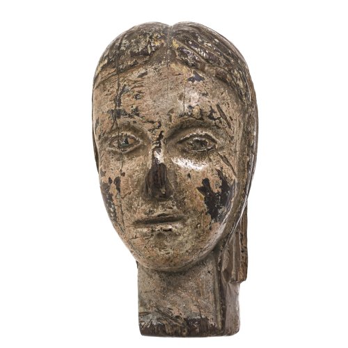 Kopf einer Heiligen. Südeuropa. Holz, ehemals farbig gefasst. Besch. H. 16 cm.