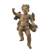 Putto. Süddeutsch 18./19. Jh. Schwebender Putto. Holz, rückseitig flach gearbeitet. Flügel montiert. Oberfläche mit Beize angelegt. Ein Finger fehlend, starke Alterungsspuren, rest. H. 78 cm.