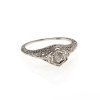 Ring. Weißgold, filigran gearbeitet, ein Brillant.