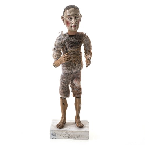 Gliederpuppe (Krippenfigur). Holz, Komposition, gefilzte Wolle. Leicht besch., rest. H. 26 cm.