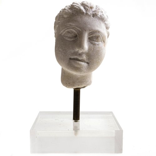 Kleiner Knabenkopf. Weißer Marmor. H. 10 cm.