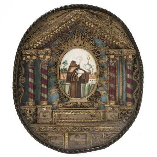 Reliquienkapsel mit Krüllarbeit. Hl. Paschalis Baylon. Messingrahmen. Alterungsspuren. 17 x 15 cm.