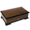 Musikspieldose. Reuge Music, Sainte-Croix, 20. Jh. Holz, teilweise geschwärzt. 7,5 x 23 x 13 cm.  Rücks. bezeichnet Maty, made in Switzerland.
