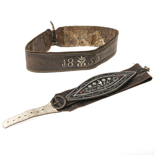 Zwei Bauchranzen. Federkielstickerei. L. 108 und 103 cm.