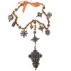 Rosenkranz. 19. Jh. Fünf Gesätze. Perlen aus Bernstein. Kreuzanhänger aus Silberfiligran. Gebrauchsspuren. L. 58,5 cm.