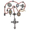 Rosenkranz. 19. Jh. Sechs Gesätze. Perlen aus Koralle. Kreuzanhänger mit Perlmutteinlage. Gebrauchsspuren. L. 61 cm.