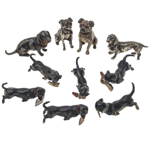 Ein Konvolut Wiener Bronzen. Zehn Hunde. Patina, teilw. farbig bemalt. L. 3-6 cm. Gebrauchsspuren.