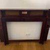 Ein Sideboard. Um 1905. Entwurf wohl Hans Christiansen, Ausführung Ludwig Schäfer. Buche, Palisander furniert. Mittig appliziert ein kleines goldfarbenes Relief mit nackter junger Dame. Rest., Gebrauchsspuren.