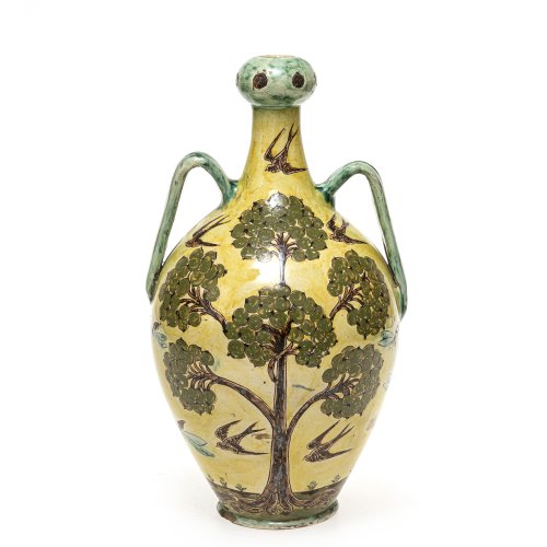 Henkelvase. Keramik, farbig glasiert. Baum- und Vogeldekor. Best. H. 33 cm.