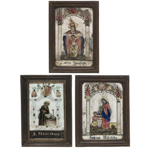 Drei Hinterglasbilder. Schönstein bzw. Buchers. Gnadenbild von Sonntagberg, hl. Anna mit Maria und hl. Franziskus. Besch., rest. 22 x 15,5 cm (2x) und 19,5 x 12 cm.
