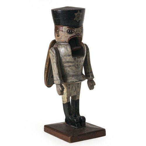 Nussknacker. Erzgebirge. Holz, farbig bemalt. In Form eines Bergmanns. Alterungsspuren, min. rest. H. 27 cm.