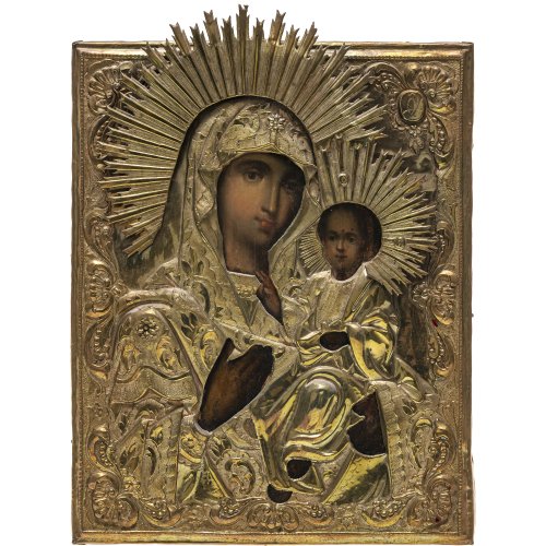 Russland, Ende 19. Jh. Ikone der Gottesmutter von Tichwin (Tichwinskaja). Tempera/Holz und Messingoklad mit getriebenem Dekor. 29,5 x 23 cm. Alterungsspuren, minim. berieben.