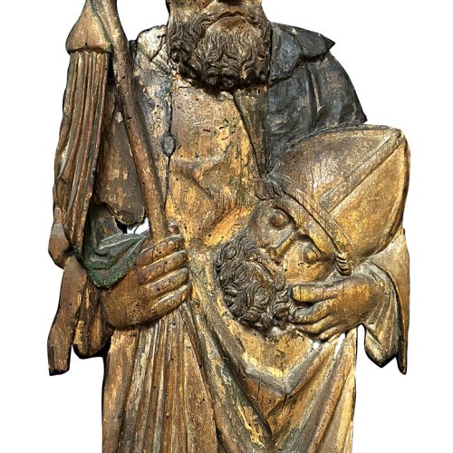 Süddeutsch, 17./18. Jh. Hl. Dionysius. Relief. Holz, ungefasst. Rep., besch. H. 62,5 cm.
