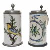 2 Walzenkrüge. Deutsch, 18./19. Jh. Vogel und Blumendekor. Rep., besch. H. je ca. 23 cm.