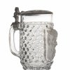 Krug. Genopptes Pressglas mit plastischem Satyrkopf. H. 17 cm.