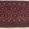 Teppichfragment. Tekke, Turkmenistan, 1. Hälfte 20. Jh. Ohne Rückwand, auf Brett appliziert. 117 x 73 cm.