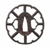 Tsuba. Japan, Edo/Meiji. Eisen. In Form eines Wagenrades. ø 7 cm.