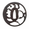 Tsuba. Japan, Edo/Meiji. Eisen. Fliegende Gans(?) über Wellen. Am Rand Reste von Silbereinlagen. ø 7 cm.
