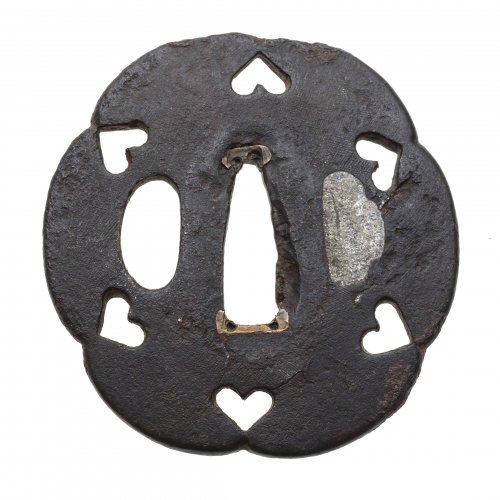 Tsuba. Japan, Edo/Meiji. Eisen, mit umlaufenden Inome-Dekor. ø 6,5 cm.
