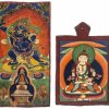 Zwei Paneele. Tibet, 19. Jh. Darstellung einer Gottheit über einer Stupa bzw. einer Gottheit im Lotossitz. Gebrauchsspuren. 46 x 23 cm bzw. 30 x 23,5 cm.