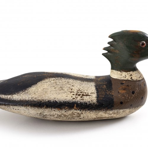 Lockente. Holz, übergangene Farbfassung. L. 44 cm. Best.