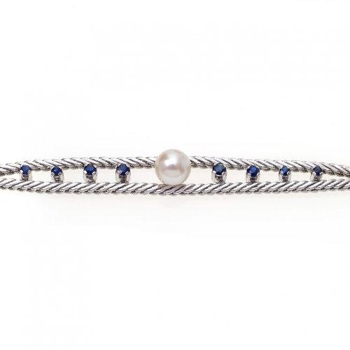 Armband mit Perle und Topasen.