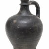 Henkelflasche, Irdenware, geschwärzt, H. 25 cm.