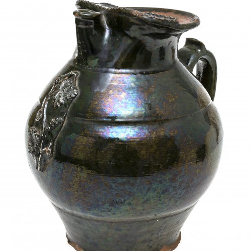 Henkelkanne, Irdenware,grün glasiert, H. 26 cm.