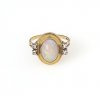Ring, Opal- Brillantbesatz, 18 K GG.