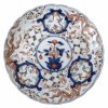 Platte, Japan, Porzellan, farbige Malerei im Imari-Stil, ø27 cm.