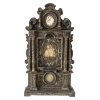 Hausaltar mit Wachsarbeiten und Aquarellmedaillon des hl. Josef, süddeutsch, 18. Jh., Portalrahmen, H. 62 cm.