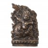 Gottheit mit Fabeltier, Bronze, Tibet, H. 11 cm.