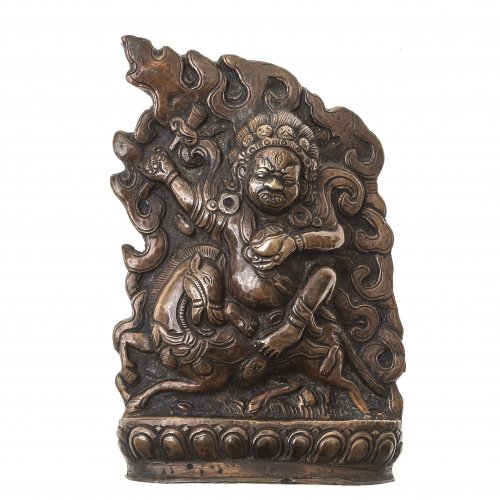 Gottheit mit Fabeltier, Bronze, Tibet, H. 11 cm.