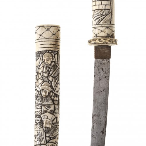 Tanto, Japan um 1900. Griff und Scheide aus Bein, Gravurdekor, L. 28 cm.