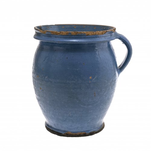Henkelkrug, Irdenware, blau glasiert, Kröning, H. 22 cm.