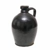 Henkelflasche (Blutzer). Kröning, Irdenware, schwarz matt. Leicht besch. H. 23,7 cm.